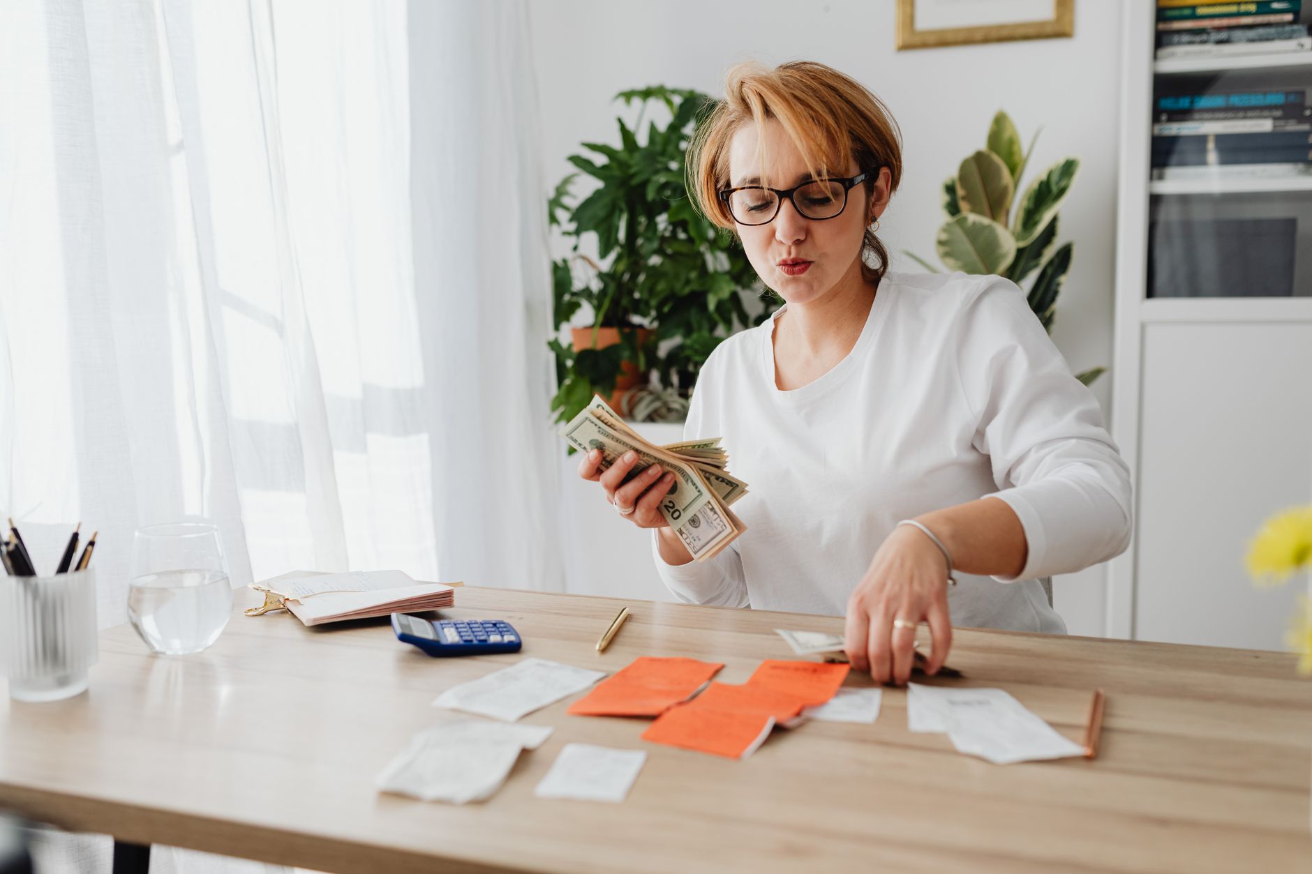 Business owner managing cash flow and line of credit repayments